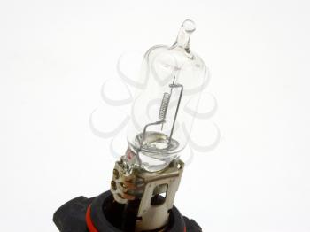 Automobile lamp of a headlight on a white background with a spiral
