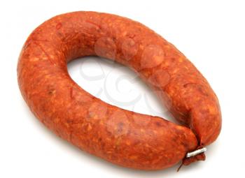 Tasty sausage is curtailed by a ring lies on a white background
