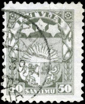 LATVIA - CIRCA 1923: A stamp printed in Latvia shows Latvian Coat of Arms, circa 1923