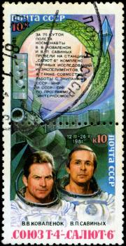 USSR - CIRCA 1981: stamp printed in USSR, shows portraits of cosmonauts Kovalenko and Savinin,75 hours in space flight, circa 1981