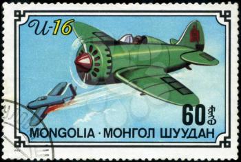 MONGOLIA- CIRCA 1976: A stamp printed in Mongolia shows airplane I-16, series, circa 1976