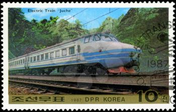 DPR KOREA - CIRCA 1987: A stamp printed in DPR Korea (North Korea) shows Electric trane Juche and Electric locomotive Mangyongdae, circa 1987