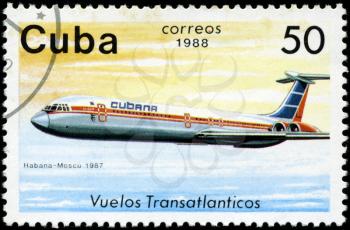 CUBA - CIRCA 1988: A Stamp printed in CUBA shows image of the airplane in transatlantic flight, Habana - Moscou in 1987, circa 1988