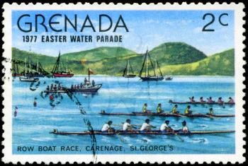 GRENADA - CIRCA 1977: A stamp printed in Grenada issued for the easter water parade  shows row boat race, circa 1977.