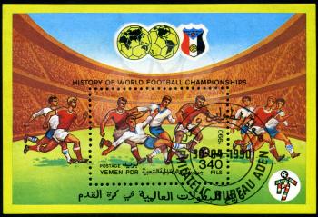 YEMEN - CIRCA 1990: stamp printed by Yemen, shows soccer players and ball, circa 1990.