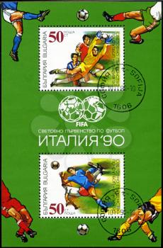 BULGARIA - CIRCA 1990: A post stamp printed in Bulgaria, shows football players, devoted word cup in Italia 1990, series, circa 1990.