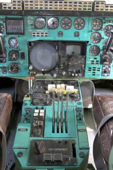 Airplane Cockpit thrust levers with hand on top for takeoff, Tu-144.