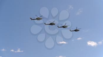 MOSCOW - MAY 7: combat helicopters Mi-28 fly in sky on training parade in honor of Great Patriotic War victory on May 7, 2017 in Moscow, Russia.