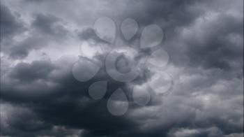 Time lapse Nature background Ominous clouds drift slowly across the sky, threatening rain. UltraHD stock footage.