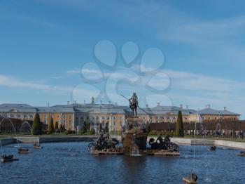 ST. PETERSBURG, RUSSIA, May 10, 2018: The Petergof or Peterhof, known as Petrodvorets from 1944 to 1997 and Neptune Fountain on May 10, 2018 in St. Petersburg, Russia