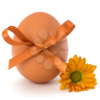 Easter egg with festive bow isolated on white background