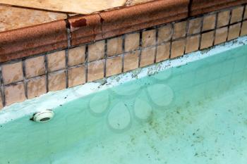 Royalty Free Photo of Damage Tiles by the Pool