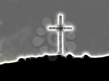 Royalty Free Photo of a Glowing Christian Cross Standing on Hill