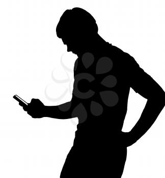 Side profile portrait silhouette of a teenage boy texting on smart phone 