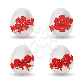 Royalty Free Clipart Image of Four Eggs With Bows