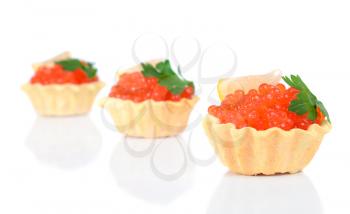 caviar red is in a panary small basket isolated on white background