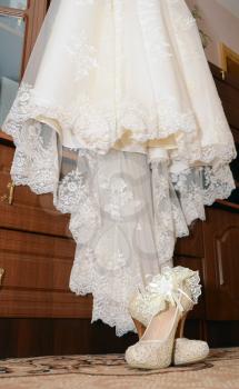 shoes with garter and dress for the bride