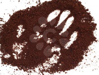 handprint on the background of coffee