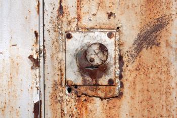 Old padlock on garage collars 