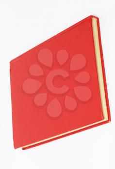 Red book on white background 