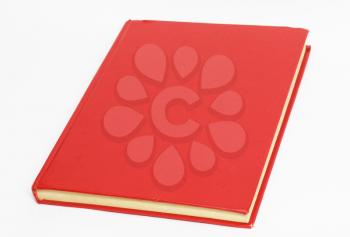 Red book on white background 