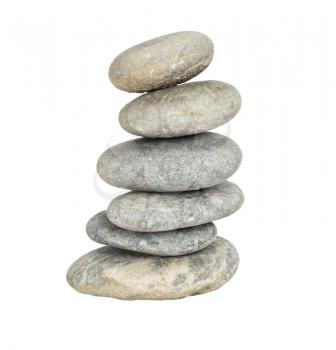 A stack of slightly off-balanced zen stones isolated on white background. 