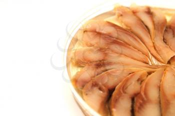 herring in oil on a white background