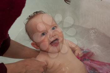 baby bathed in a bath