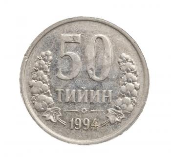 Uzbek coin on white background