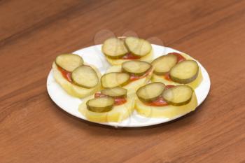 pickles on boiled potatoes