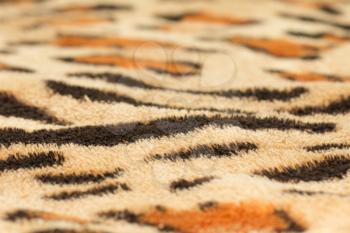 background from a fabric tiger skin