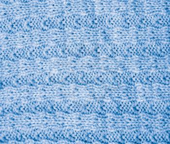 background of the blue knitted fabric. texture
