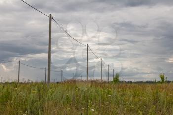 poles with electricity in the