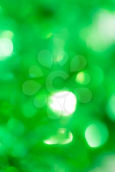 Beautiful festive green bokeh as background