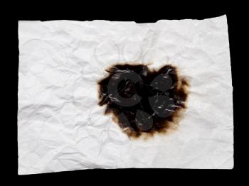 burnt crumpled white paper on black background
