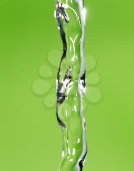 a jet of water on a green background