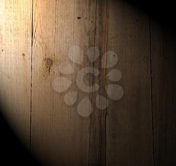 a light beam on the wooden background