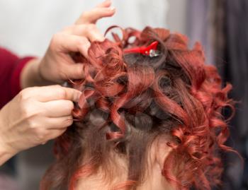curls of hair in a beauty salon