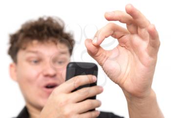 man with phone on a white background