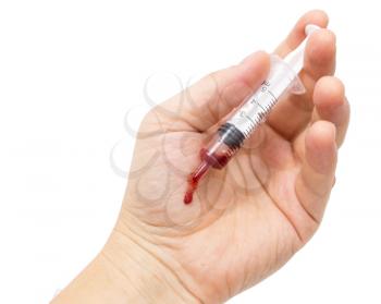 syringe in hand on white background