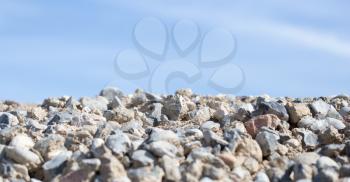 stones on nature on a background of blue sky