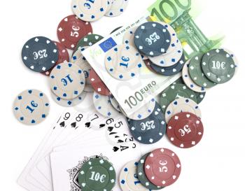 Casino chips and cards, and a hundred euros on a white background