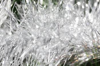 silver tinsel New Year as a background