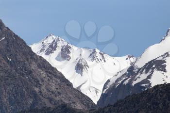 the snowy peaks of the Tien Shan Mountains. Kazakhstan