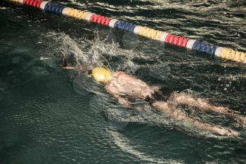 boy swimming in the pool