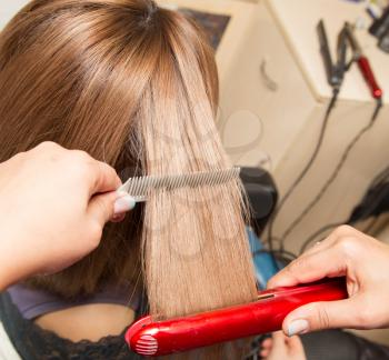 Hair styling in a beauty salon