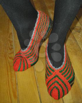 Hand knitted female slippers