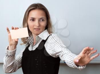 Royalty Free Photo of a Woman Holding a Card