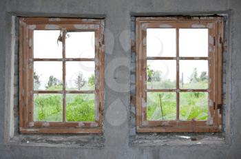 Royalty Free Photo of Two Old Windows