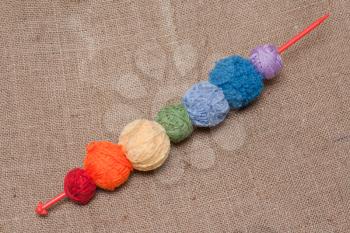 Royalty Free Photo of Balls of Yarn on a Needle